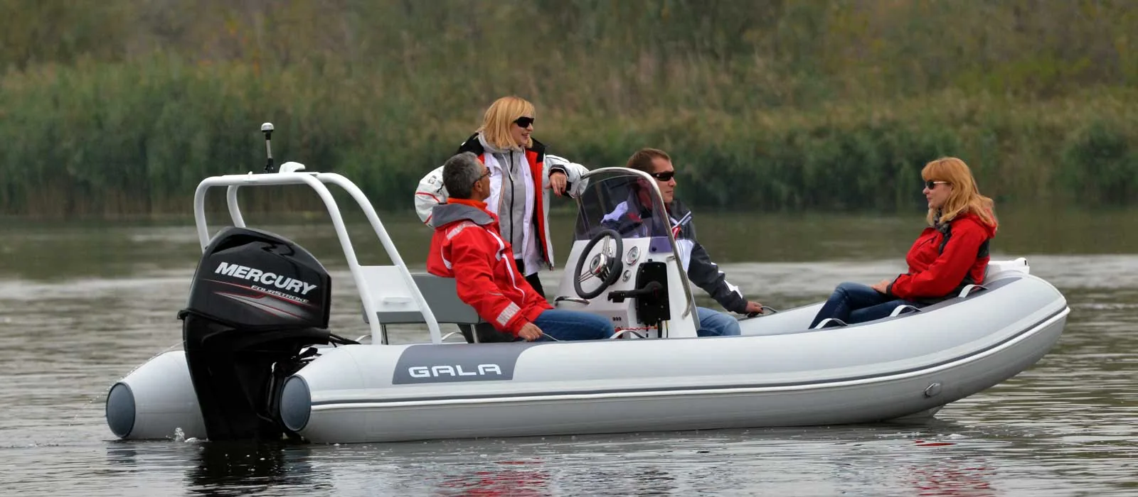 Passengers aboard a Gala Atlantis Deluxe center-console tender