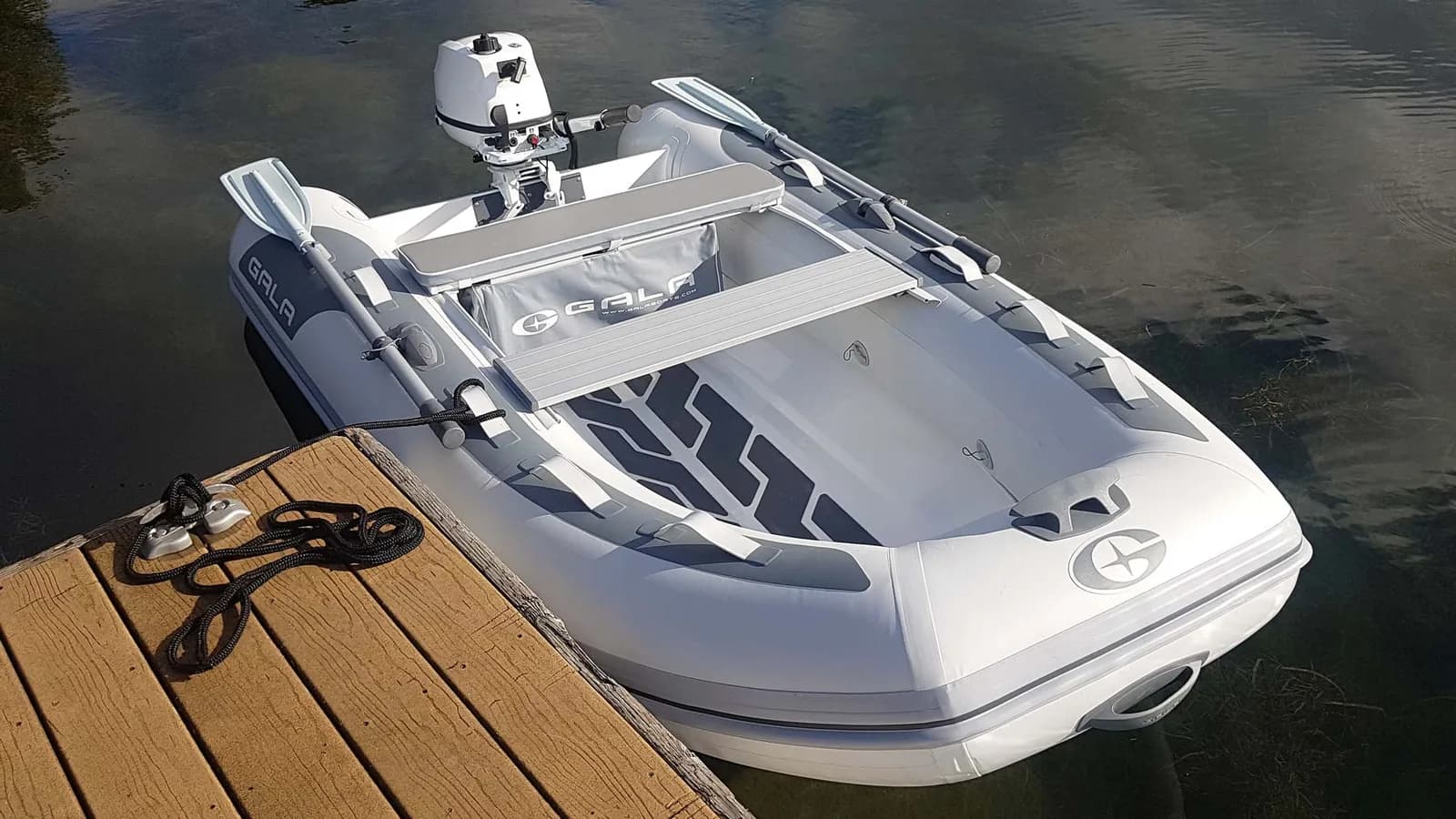 Gala Atlantis Lite tender moored beside a dock