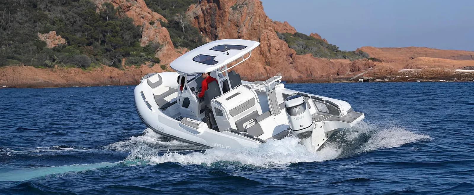 Gala Viking V8 running across coastal water